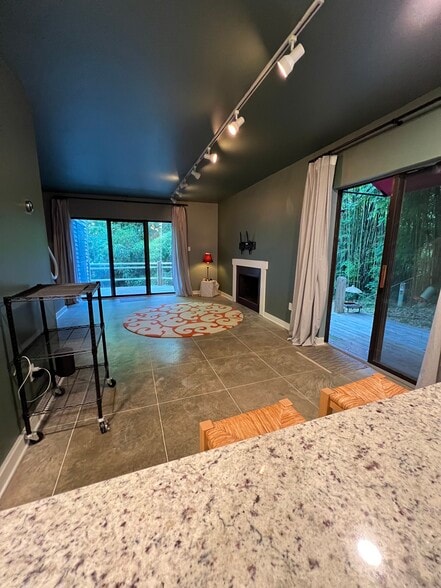 living area from kitchen - 130 E Longview St
