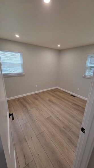Bedroom #2: fully renovated, with LED recessed lighting and one new closet - 604 Holly Ln