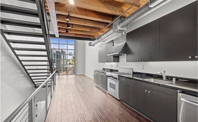 Building Photo - Office Space Living 2 BR 2.5 BA Attached 2 Car Garage