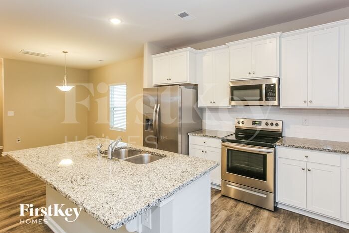 Building Photo - 10720 Rivergate Dr NW