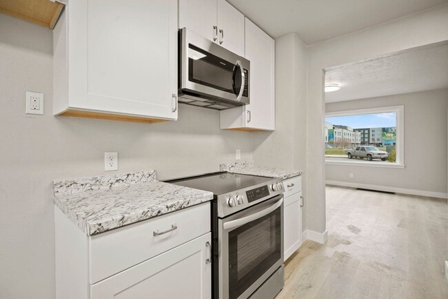 Building Photo - Enjoy a move-in ready home with brand new ...