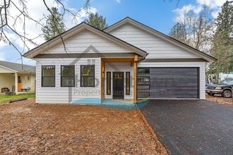 Building Photo - 2025 Home with 3 Bedrooms, 2 Bathrooms, and an Attached 2-Car Garage Available in Sandpoint!