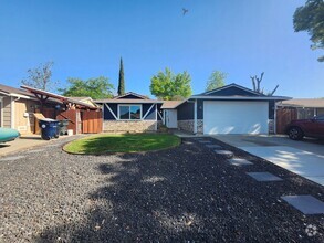 Building Photo - Charming 3-Bedroom Home with Spacious Yard...