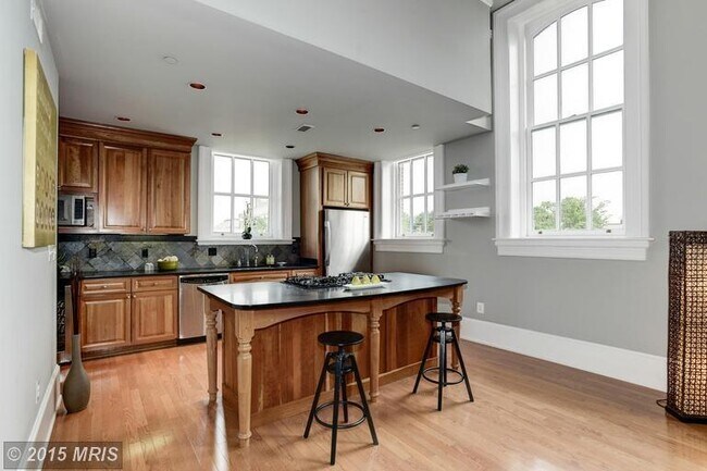 Building Photo - You ever see a place and wonder, "who is l...
