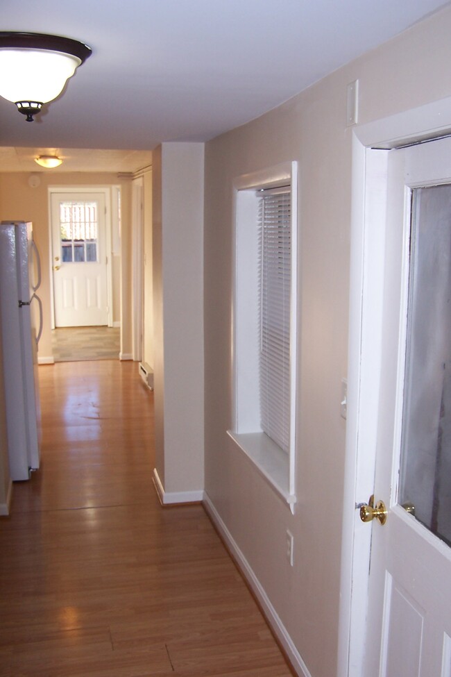 From Kitchen looking into Dining room and Laundry - 141 N Bedford St