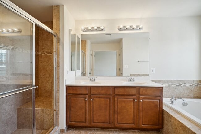 Building Photo - This beautiful townhome spans three finished levels and over 2800 square feet.