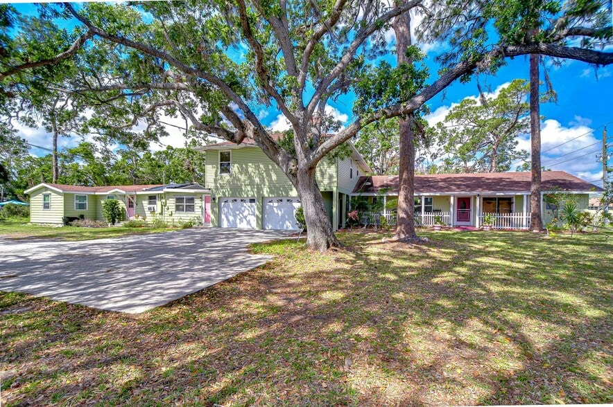 The property in its entireity, there is dedicated parking for the lazy manatee. - 5114 33rd St E