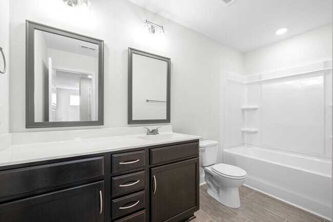 Building Photo - Pet Friendly Three Bedroom with Bonus!