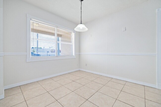 Building Photo - "Charming 4-Bedroom Tampa Home with 2 Full Baths and Spacious Layout!"