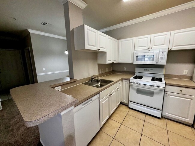 Building Photo - Spacious 2 Bed / 2 Bath Second-Floor Condo at Grand Reserve at Kirkman Park
