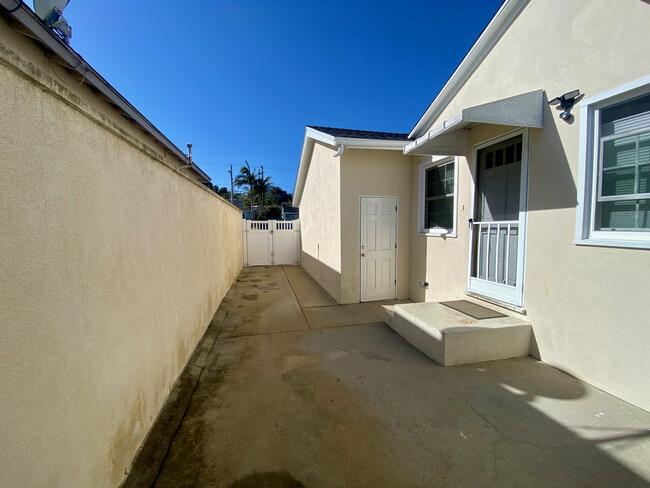 Side of house. Kitchen/Garage door - 21806 Redbeam Ave