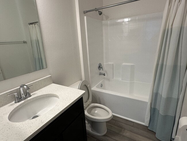 Building Photo - Nearly New 3 Bedroom Smart Home with Lawn Care Included!