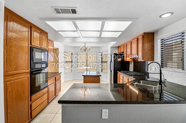 Building Photo - SW The Lakes!!!! Pool!!! Spa!!! Solar Panels!!! Primary bedroom downstairs!!! 3 Car Garage!!!