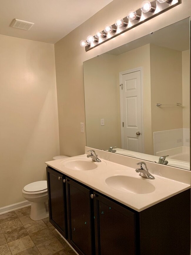 Building Photo - RENT READY Townhome Convenient to I440 & I...