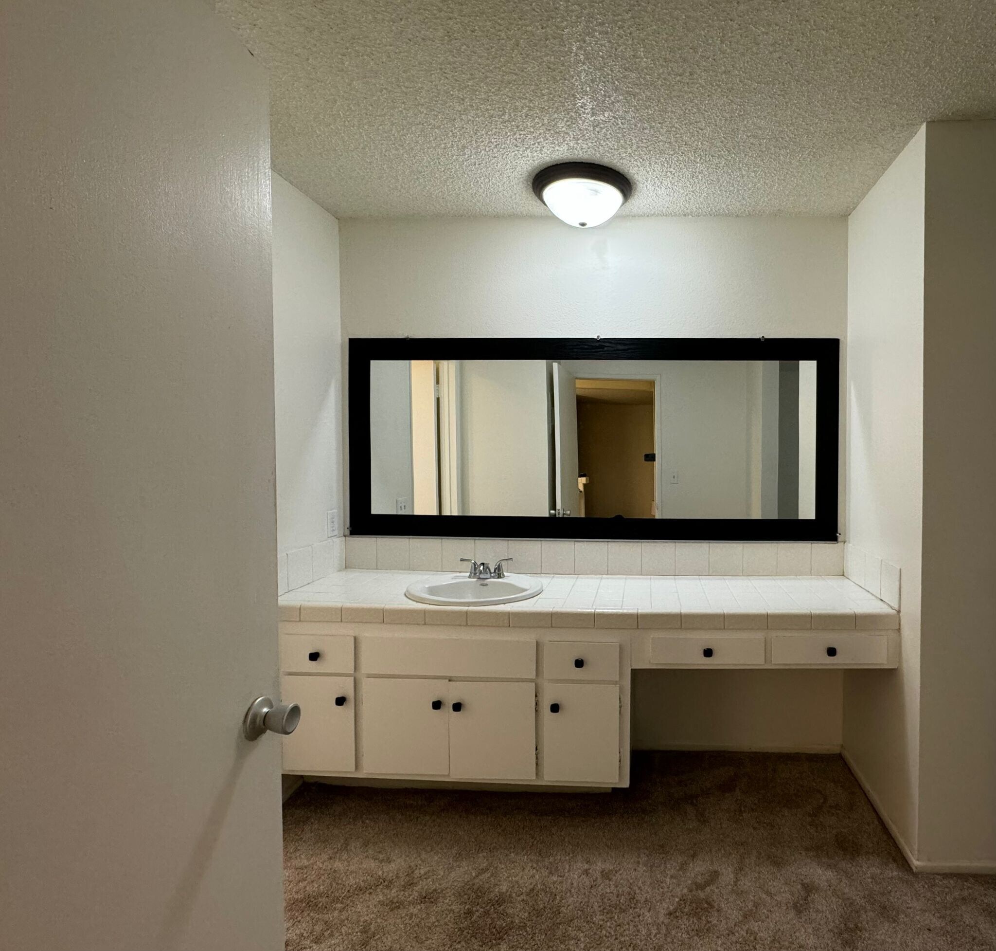 large vanity, framed mirror - 355 S Los Robles Ave