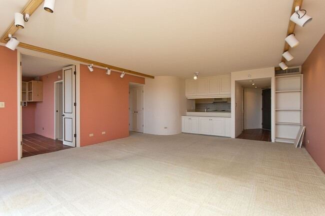 Building Photo - Royal Iolani Corner Unit - 2 PRK w/ ALL Ut...