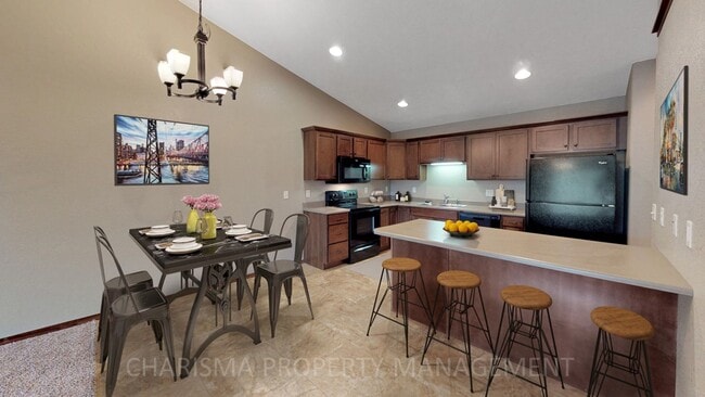 Building Photo - SPACIOUS AND AMENITY FILLED 3 BD, 2.5 BA T...