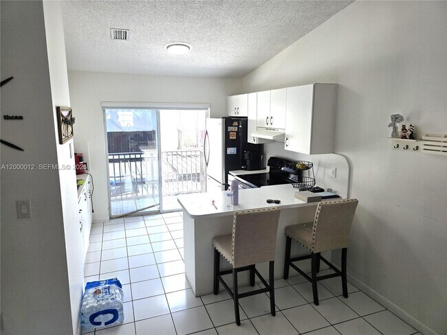 Building Photo - 7777 W 29th Ln