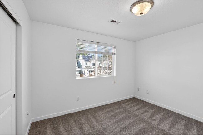 Building Photo - 6568 NE Deer Run St