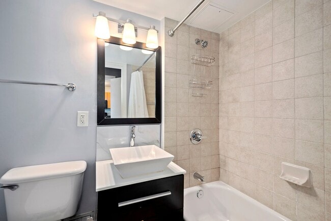 Building Photo - Available Now! Electric, Gas and Water included in Rent! Spacious Studio in an Amenity Rich Build...