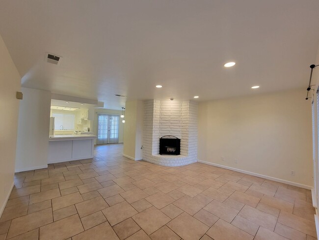 Building Photo - Condo with open floor plan and a two-car g...