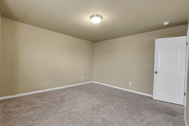 Building Photo - $2,540.95 - 4 Bed, 2.5 Bath Home in CO Springs with Fenced in Yard and 3 Car Garage!