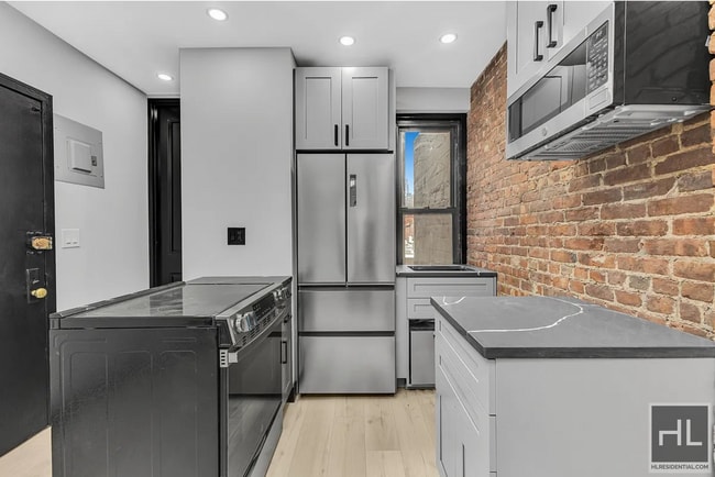 Building Photo - Renovated Hell’s Kitchen Apartment with Mo...