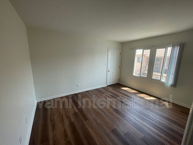 Building Photo - 9449 Normandie Ave