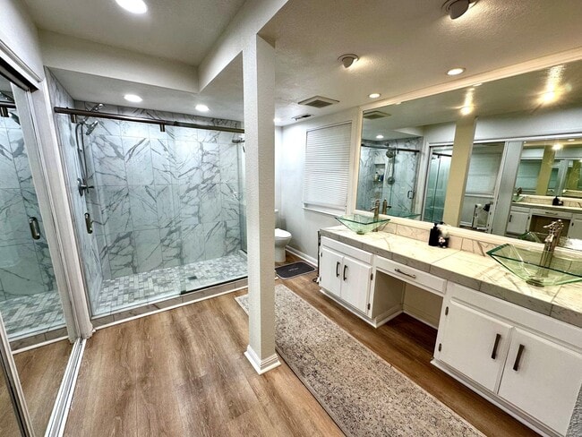 Building Photo - Sunny - Fully Furnished 2-Bedroom, with Office and 2 1/2 bathrooms.