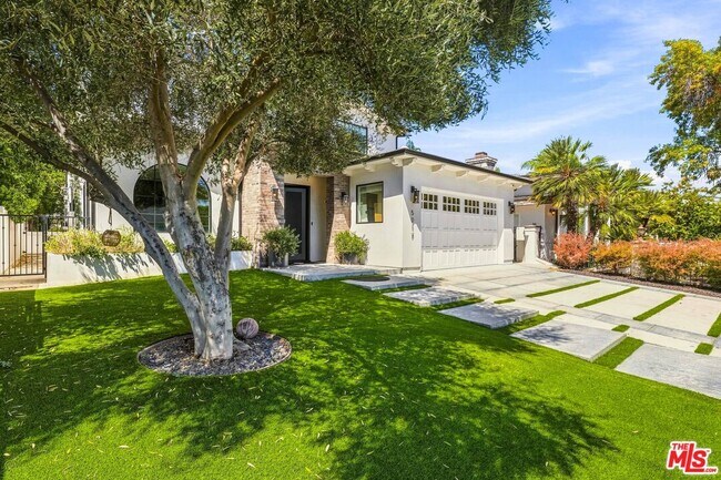 Building Photo - 5017 Hesperia Ave