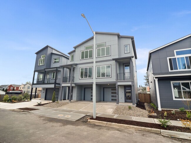 Building Photo - $500 move-in special! New, new, new! Gorgeous 2-bdrm/2.5-bath duplex townhome w/ garage, W/D, in ...