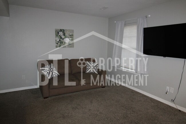 Building Photo - REDUCED PRICE! Fully Furnished One Bedroom...