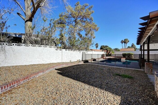 Building Photo - Fully Furnished Entertainer’s Dream with Resort-Style Pool & RV Parking!