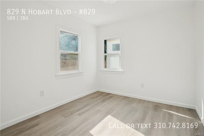 Building Photo - Luxe Living at 825 N. Hobart Blvd. – Where...