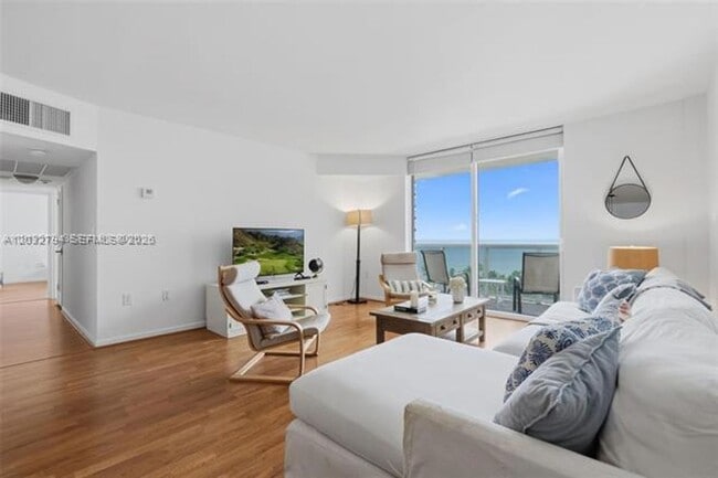 Building Photo - 10275 Collins Ave