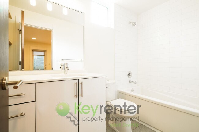 Building Photo - **Rent Special** Modern Two Bedroom Townhome with Designated Parking