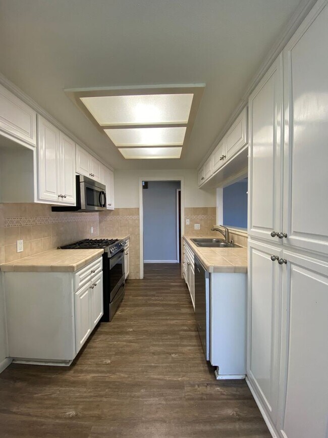 Building Photo - Large Centrally Located Two Story Condo wi...