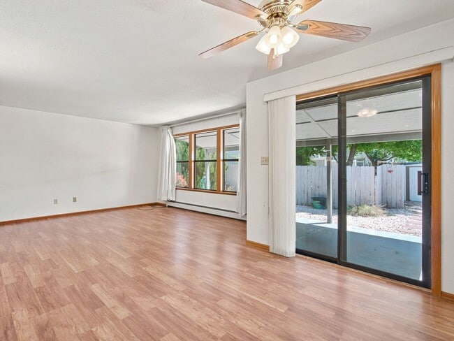 Building Photo - Spacious 2BR Rental with Open Floor Plan & Low-Maintenance yard