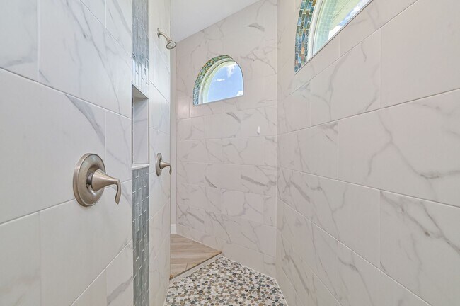 Building Photo - NOW AVAILABLE - Gorgeous Pool Home ~ NW Cape ~ 3 Car Garage ~ On Canal!