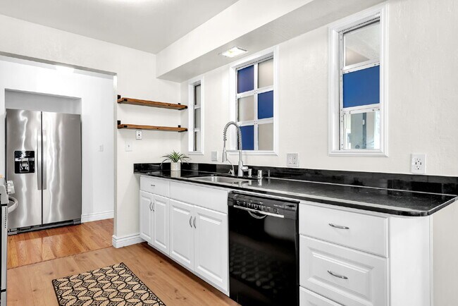 Building Photo - Discover the heart of central Davis living