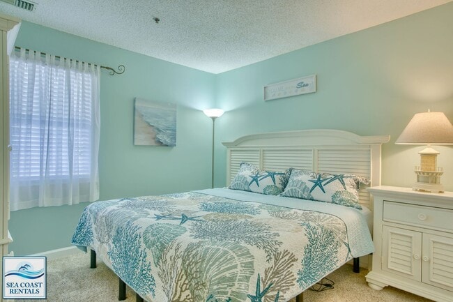 Building Photo - FULLY FURNISHED OFF-SEASON RENTAL AVAILABLE NOW THROUGH MID-MAY