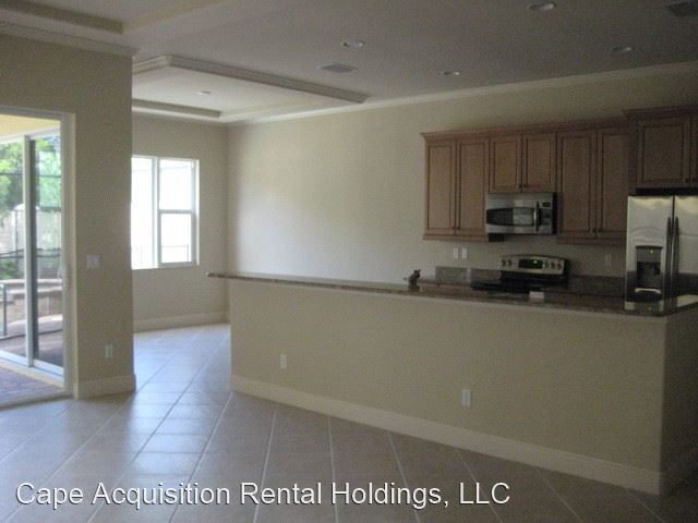 Building Photo - 3 br, 2.5 bath House - 5785 Mango Circle