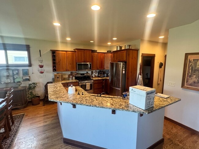 Building Photo - Large, Open Home with Beautiful Backyard and Oversized Garage