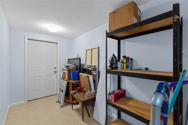 Building Photo - 7860 Holiday Dr
