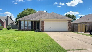 Building Photo - Welcome to this charming 3-bedroom, 2-bath...