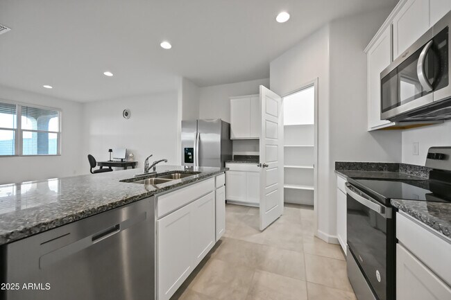 Building Photo - 38180 W Amalfi Ave