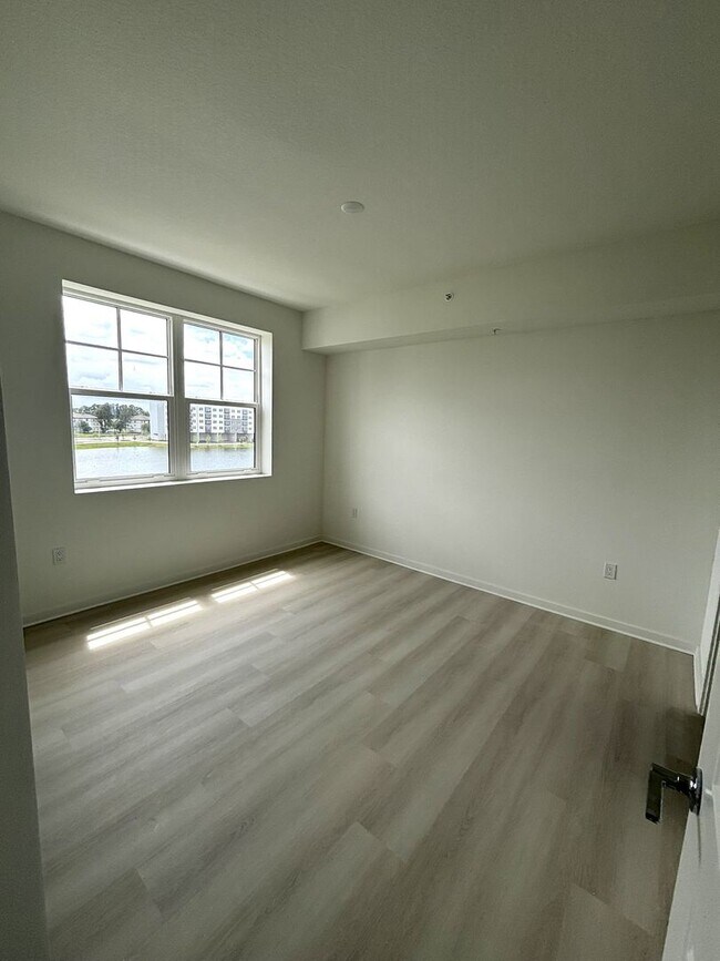 Building Photo - Beautiful and Brand New Apart in Millenia Park Orlando