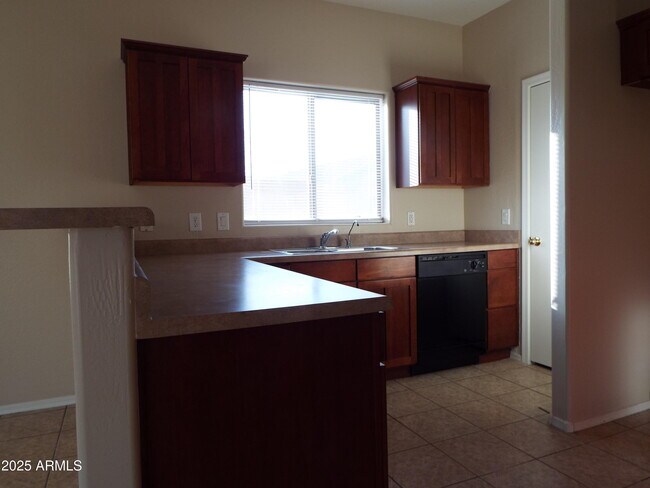 Building Photo - 24002 W Lasso Ln