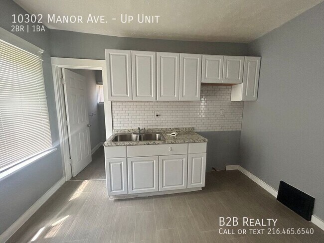 Building Photo - 10302 Manor Ave