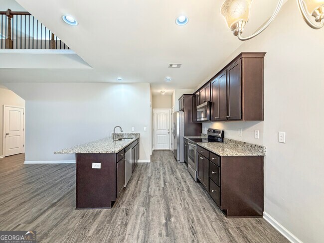 Building Photo - 6369 Woodland Station Dr